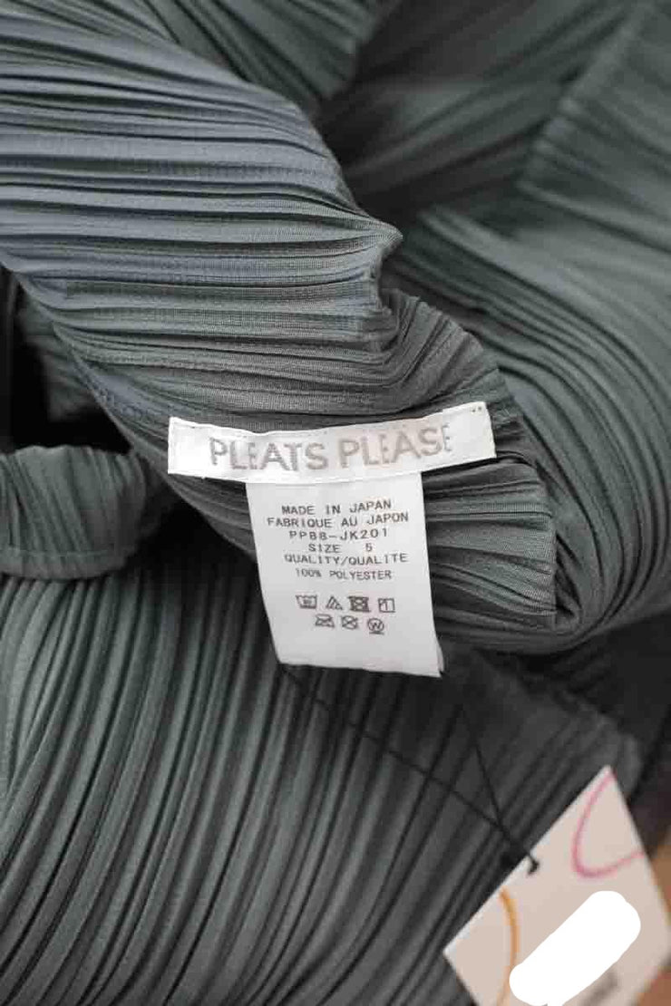 Blouse Pleats Please vert. Matière principale polyester. Taille 38.