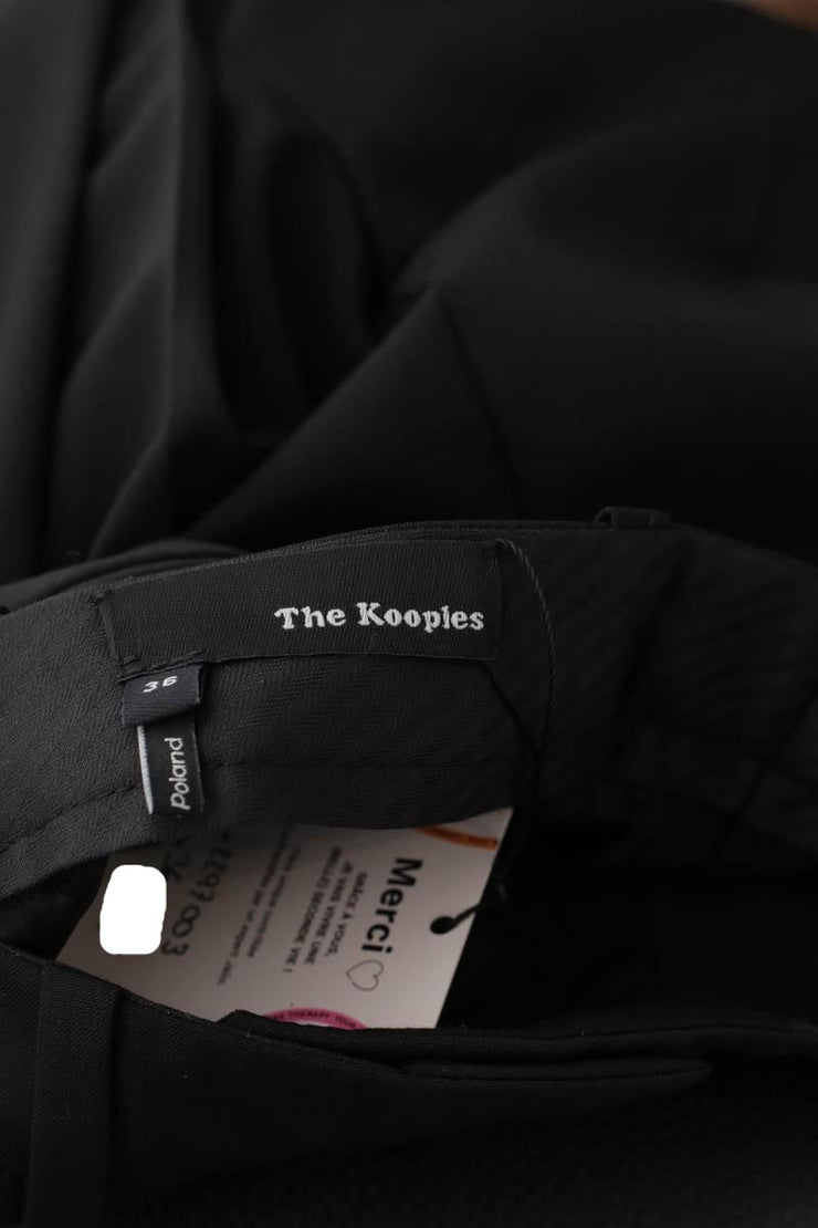 Pantalon slim The Kooples noir. Matière principale polyester. Taille 36.
