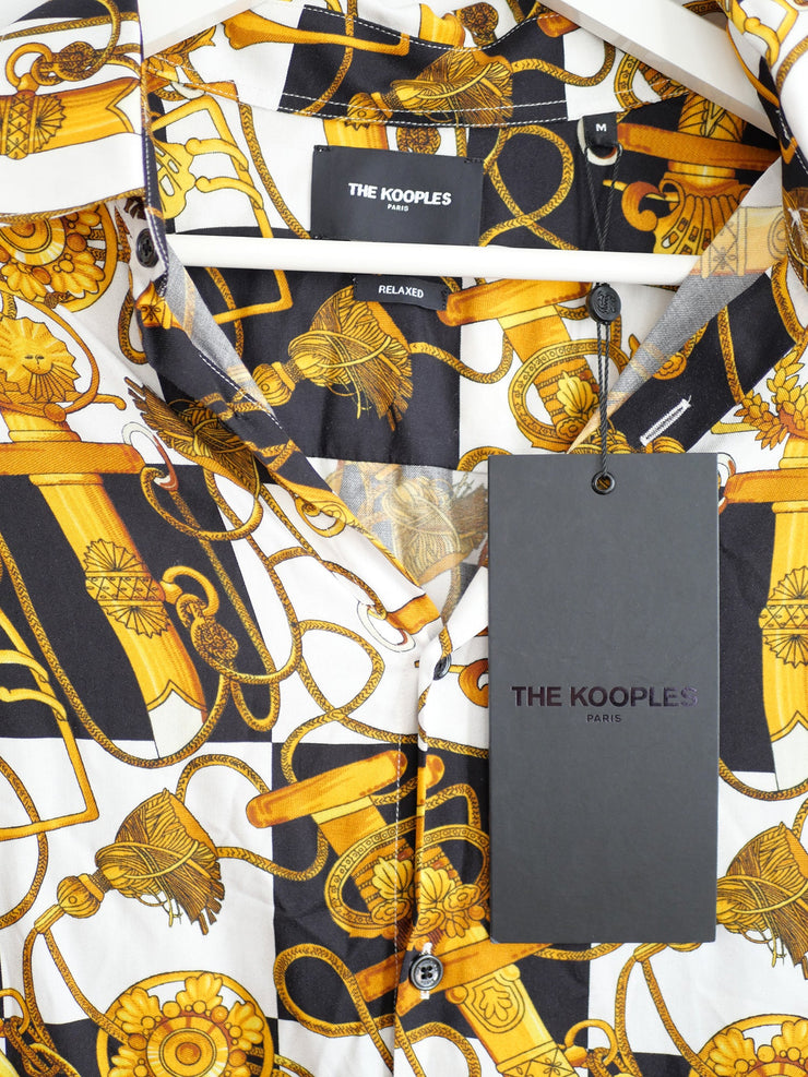 Chemise imprimé  de la marque THE KOOPLES pour femme  de taille L/40 de couleur Noir, blanc,multicolore en vente sur la friperie en ligne Circular Clothing Paris