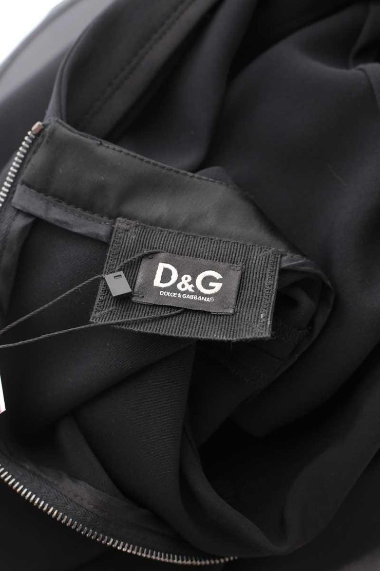 Robe Dolce & Gabbana noir. Matière principale polyester. Taille 40.