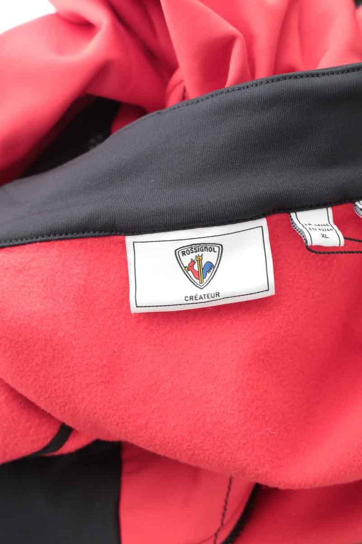 Veste Rossignol rouge. Matière principale polyester. Taille 44.