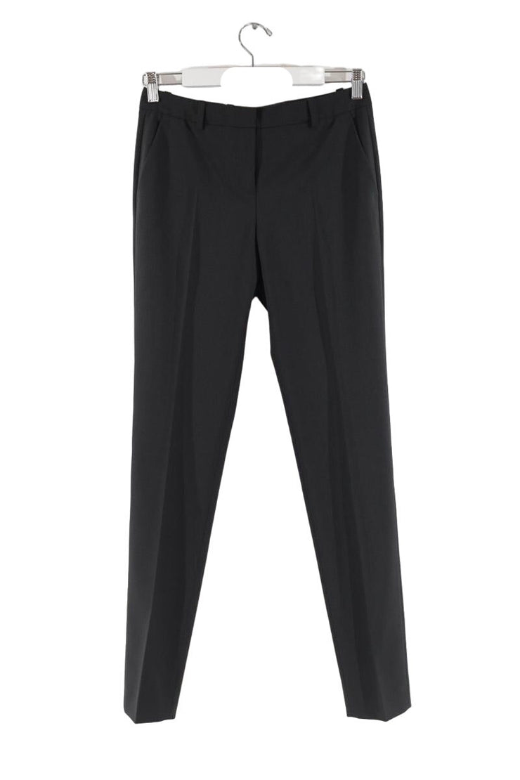 Pantalon slim The Kooples noir. Matière principale polyester. Taille 36.