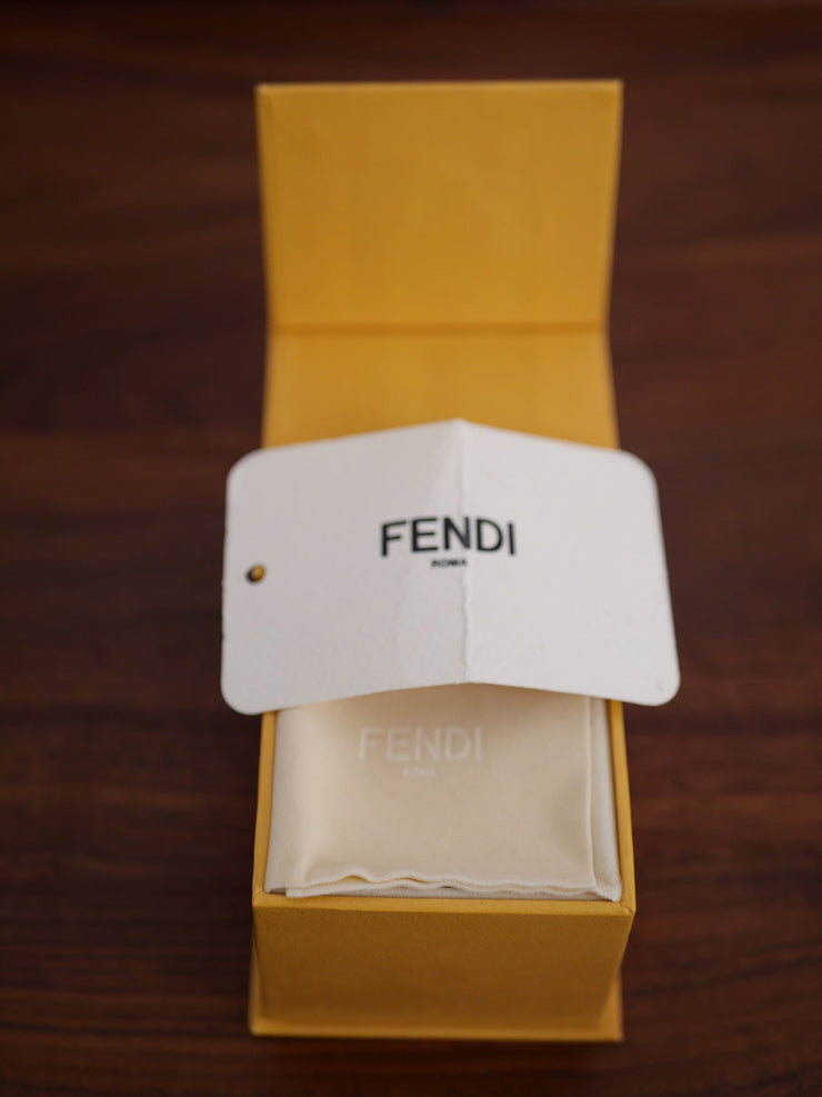 Bijou Mono boucle medium Fendihoops de la marque FENDI pour femme  de taille Taille Unique de couleur Or, Bleu en vente sur la friperie en ligne Circular Clothing Paris