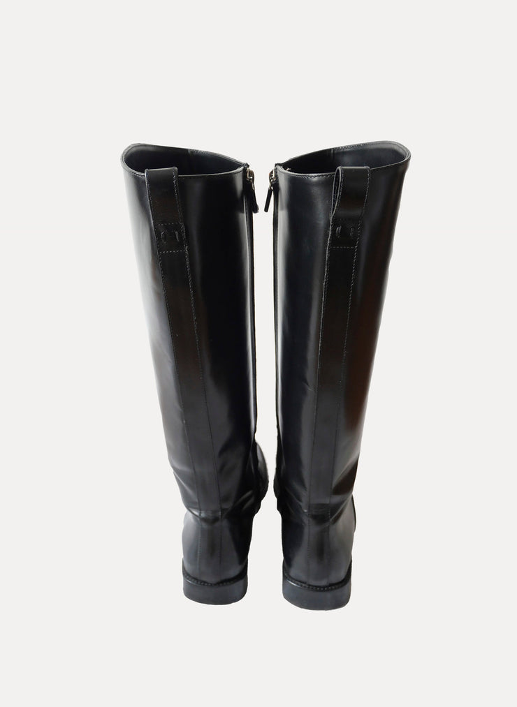 Bottes Modèle bottes cavalières en cuir lisse de la marque Louis Vuitton pour femme  de taille T38,5 de couleur Noir en vente sur la friperie en ligne Circular Clothing Paris