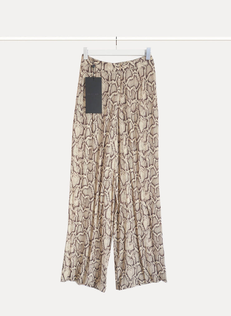 Pantalon Natural Snake de la marque THE KOOPLES pour femme  de taille S/36 de couleur Imprimé en vente sur la friperie en ligne Circular Clothing Paris