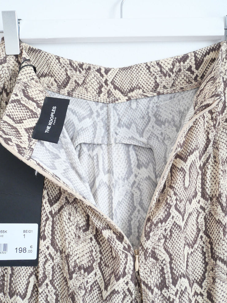 Pantalon Natural Snake de la marque THE KOOPLES pour femme  de taille S/36 de couleur Imprimé en vente sur la friperie en ligne Circular Clothing Paris